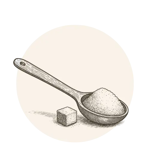 cuchara con azucar y un cubo de azucar a un costado